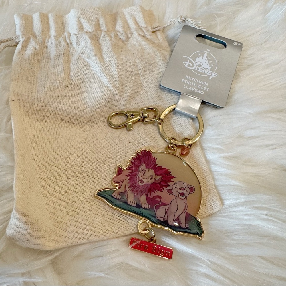 Disney Parks Animal Kingdom's The Lion King Metal Key Chain Bag Charm Fire Sign